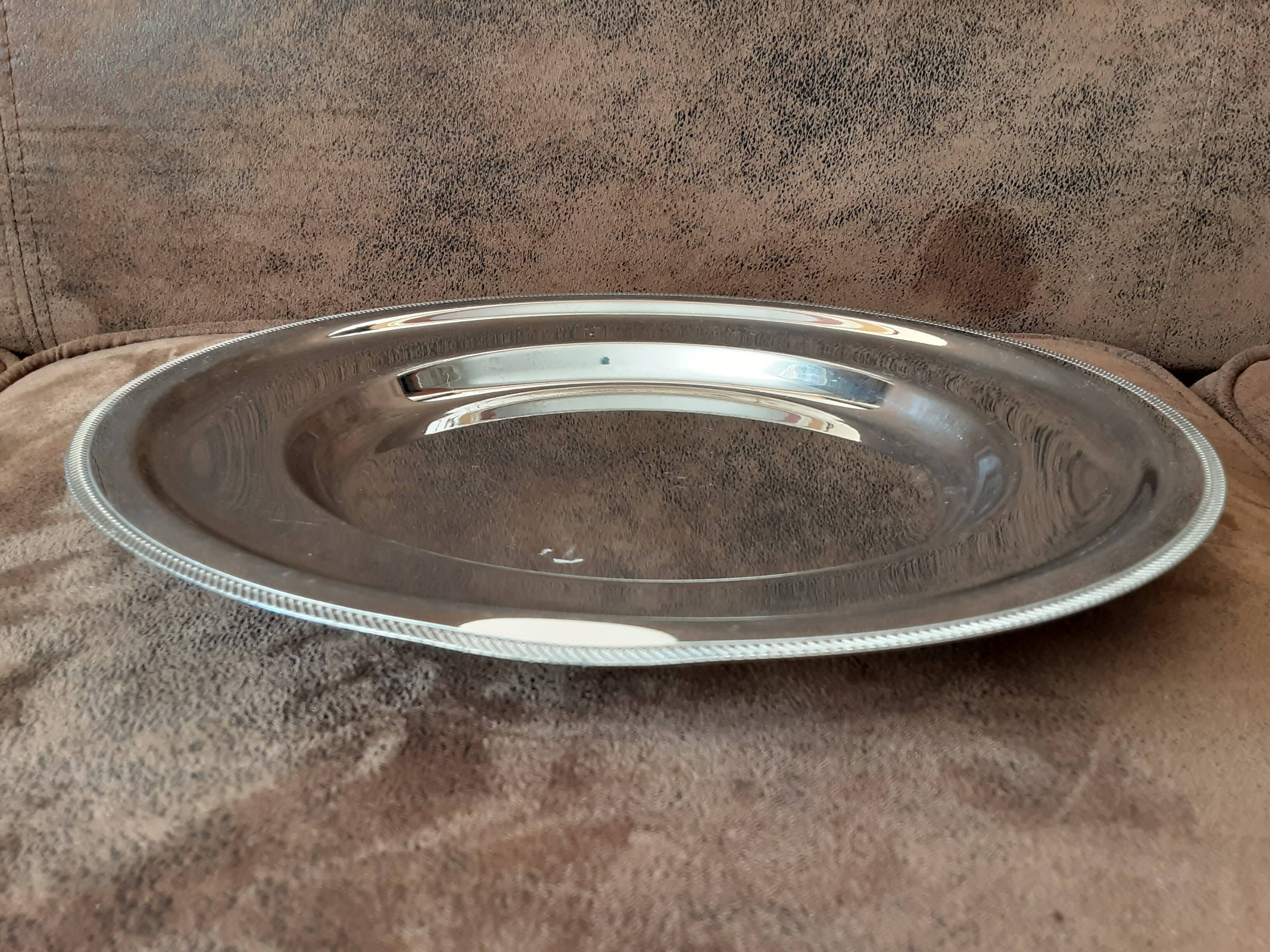 Vintage metal round plate