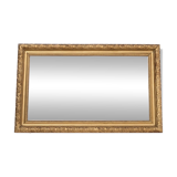 Horizontal mirror with a golden frame, France.