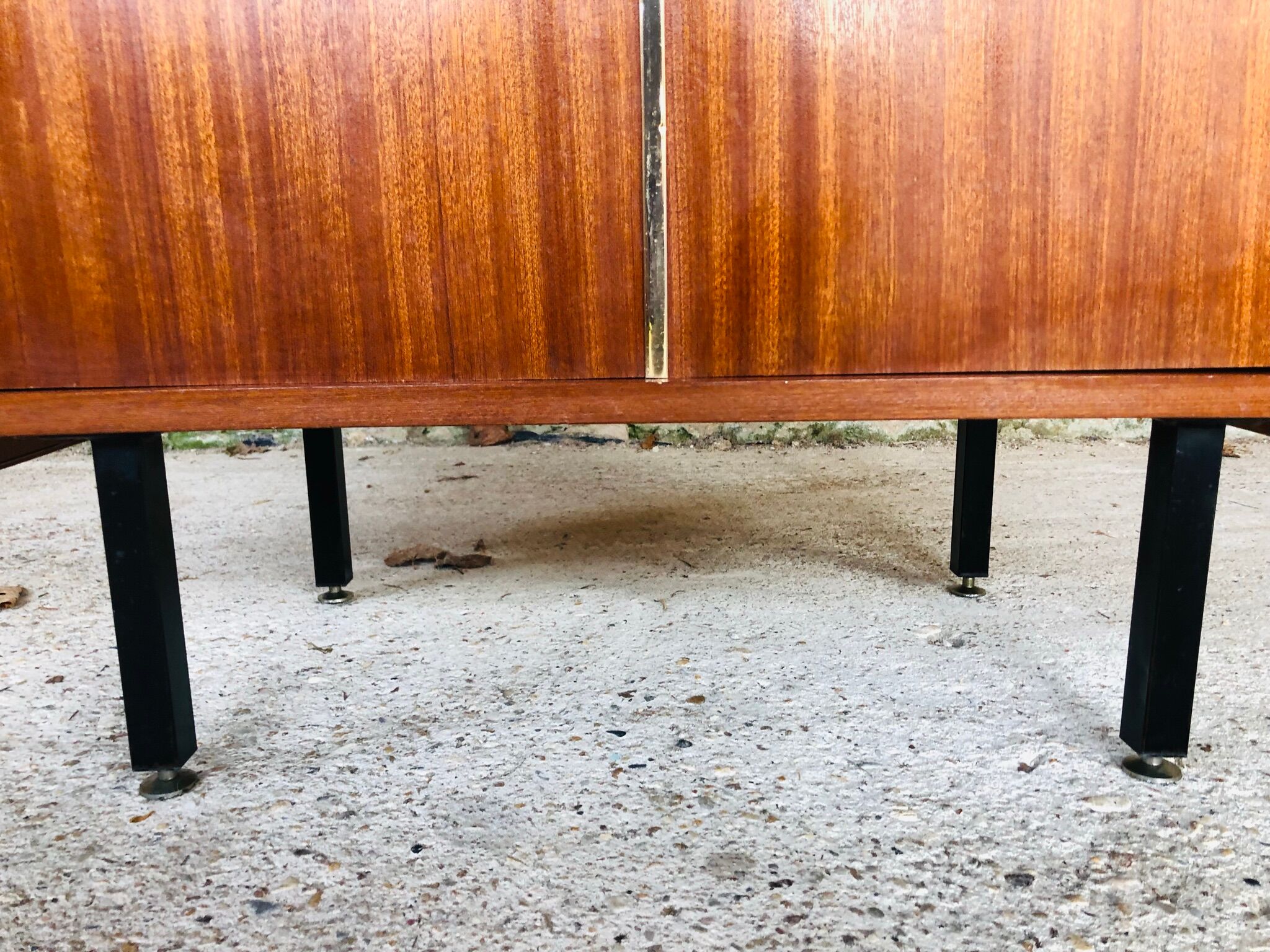 Storage cabinet with double compartment, metal feet circa 60's
