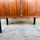 Storage cabinet with double compartment, metal feet circa 60's