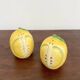 Lemon-shaped ceramic salt and pepper shakers