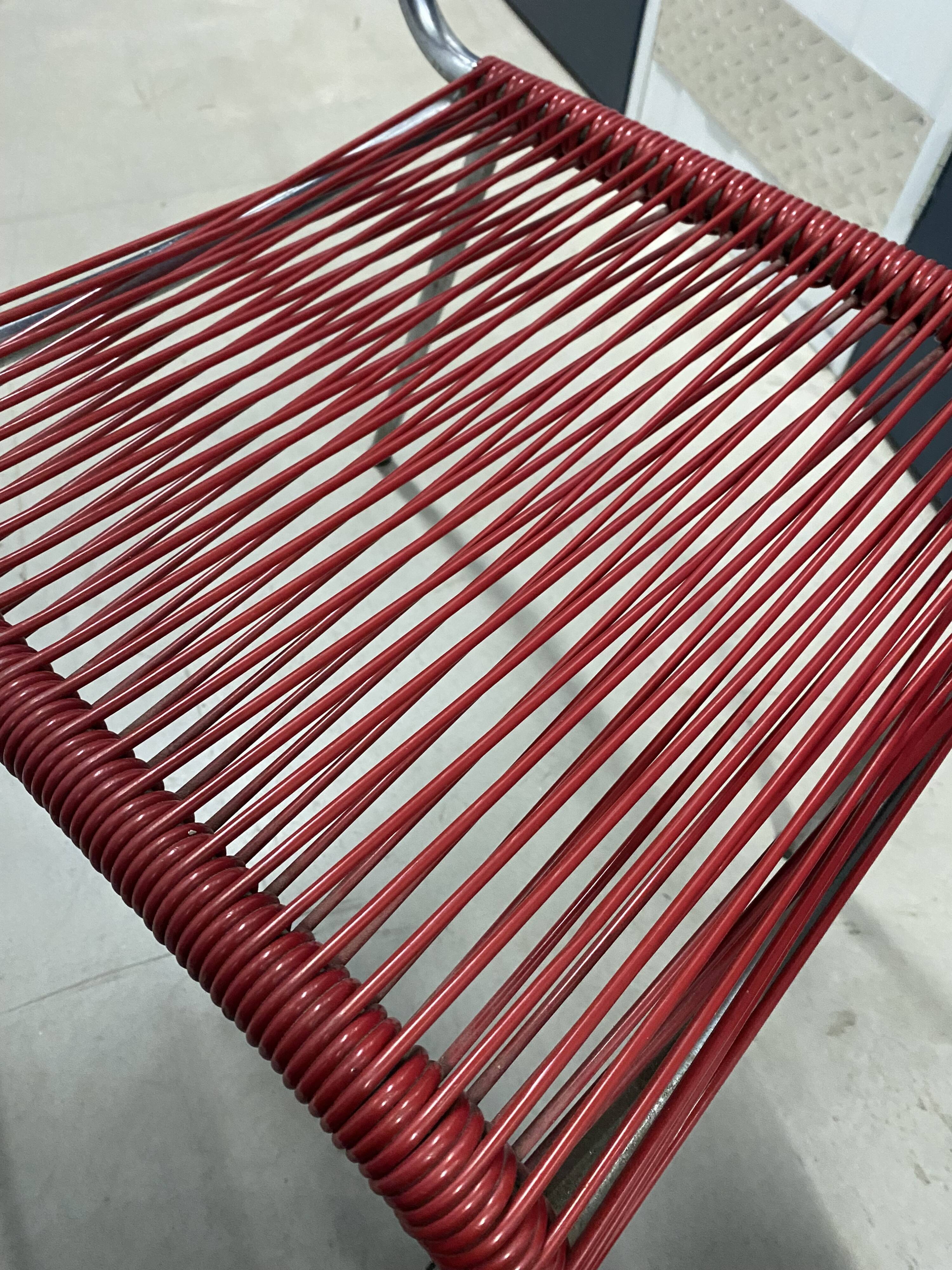 Red scoubidou chair from the 1960s.