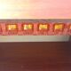 Pair of design bedside tables in orange resin rosewood with white melamine from the 70s