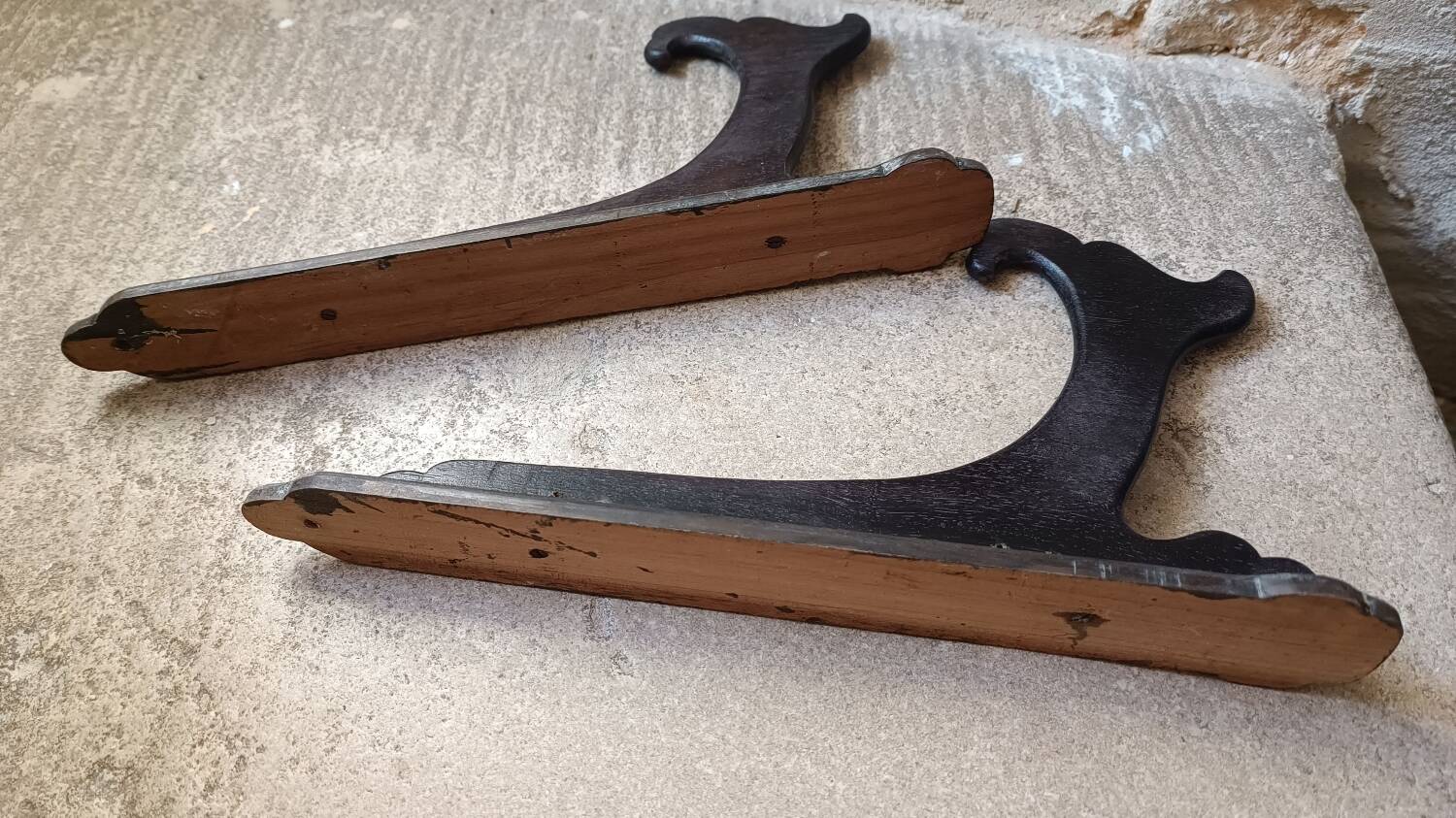 Old coat rack in blackened wood