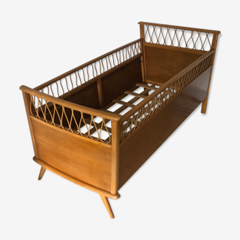Vintage wood and rattan baby cot