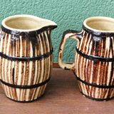 Pair of trompe l'oeil bistro pitchers, barrels