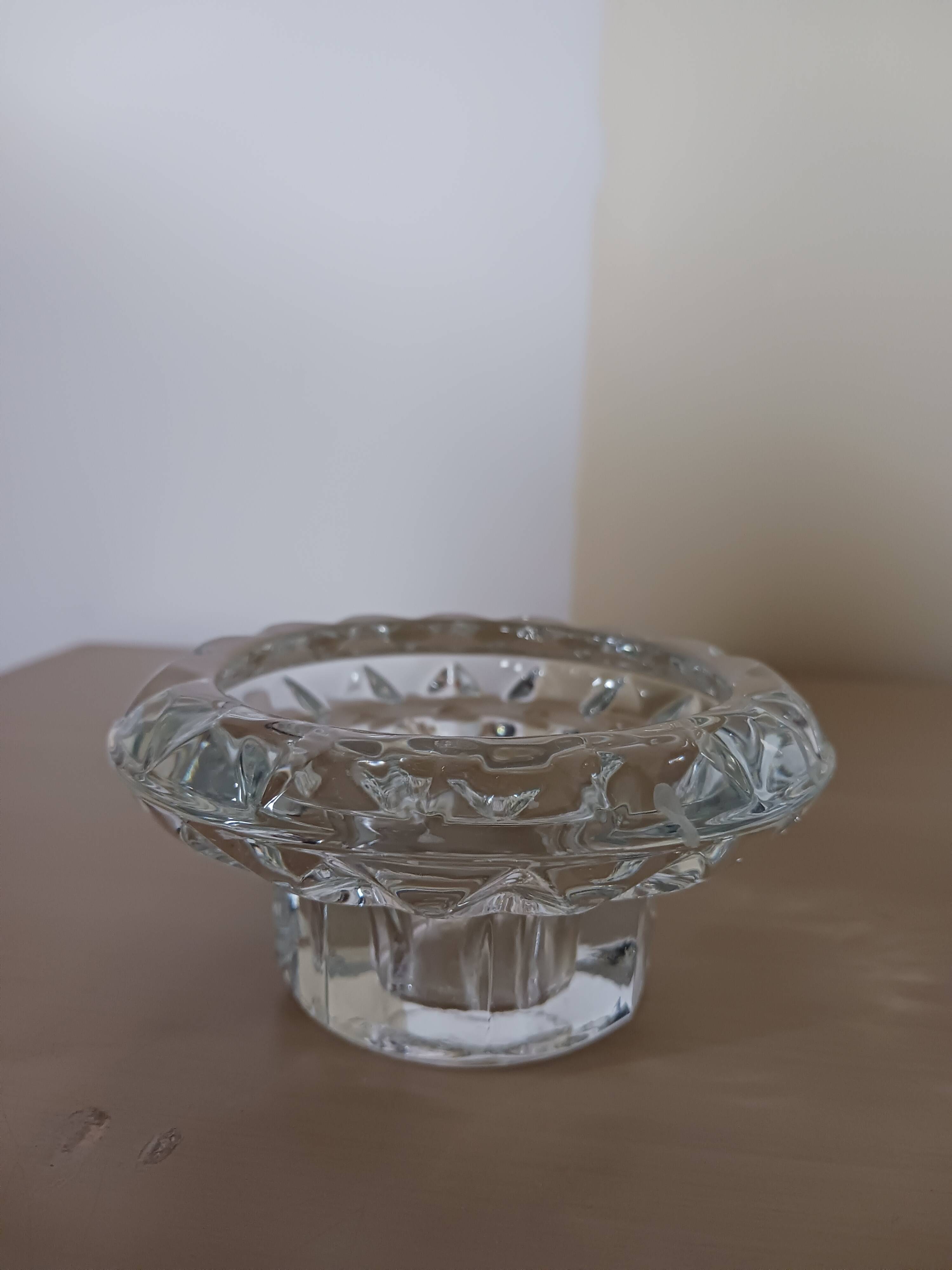 Moulded glass candle holders.