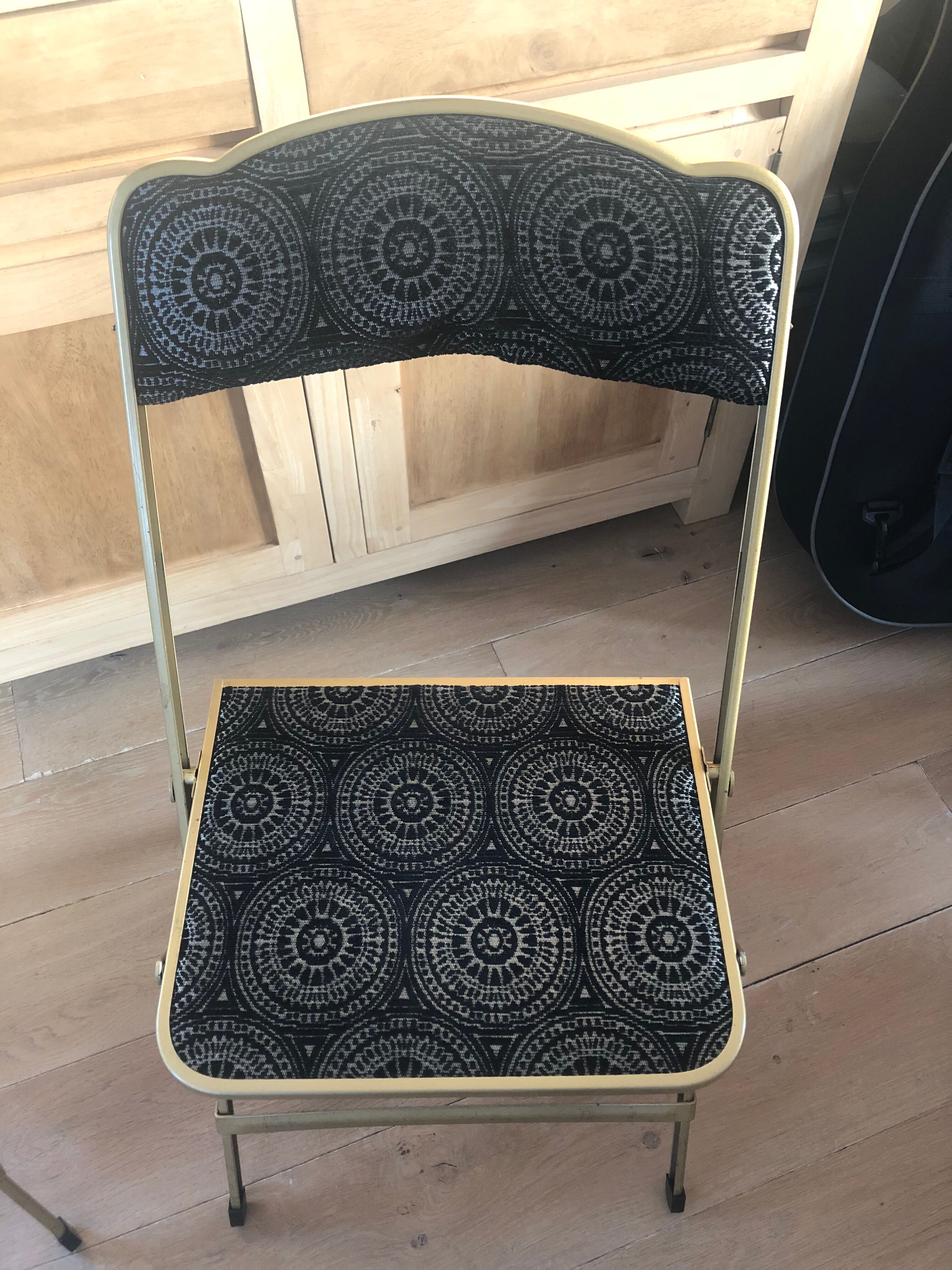 Golden and black concert chairs