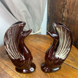 Pair of ceramic vases in the shape of swans.