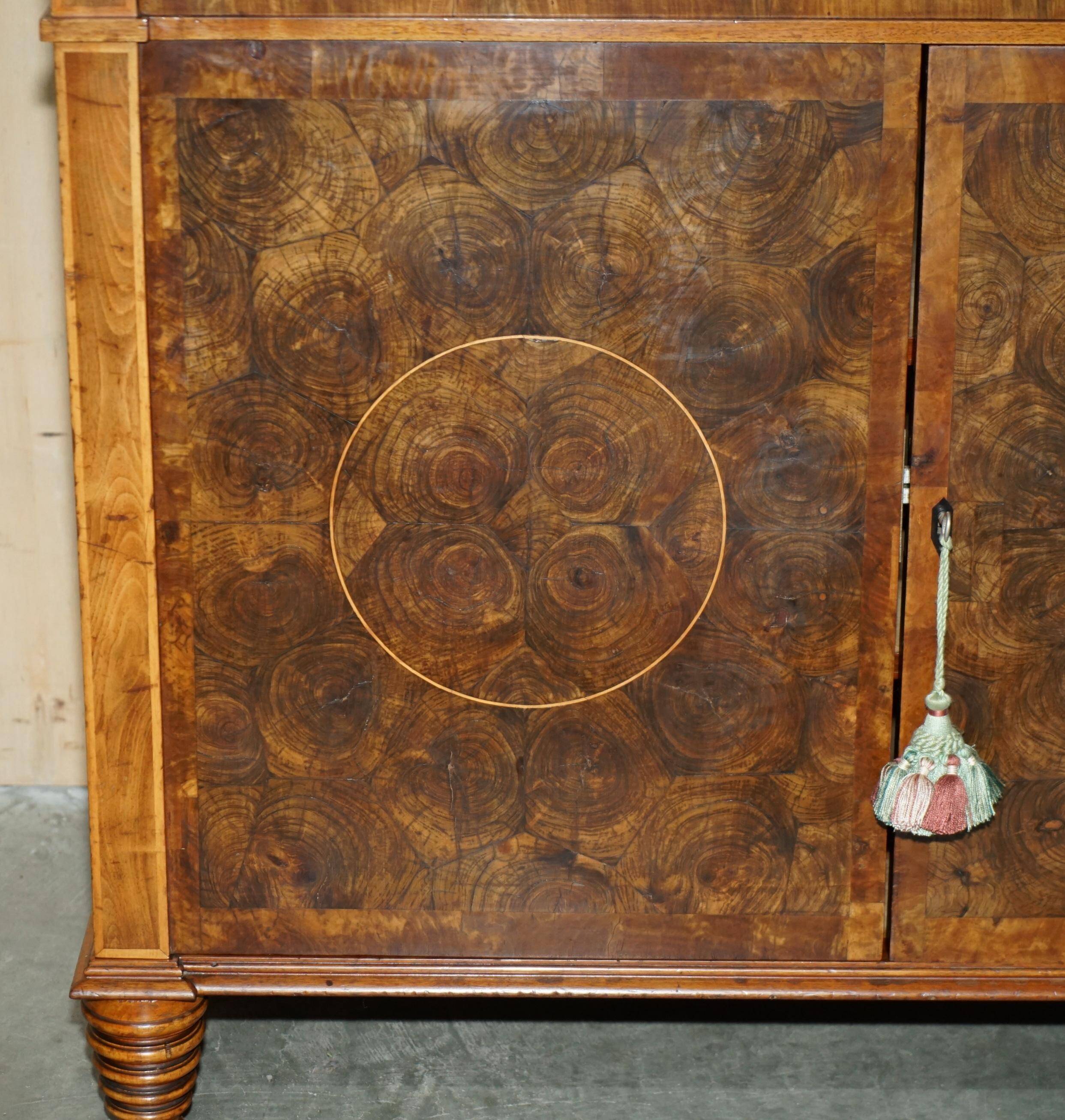 Queen Anne style pedestal commode from around 1710 in walnut and oyster veneer.