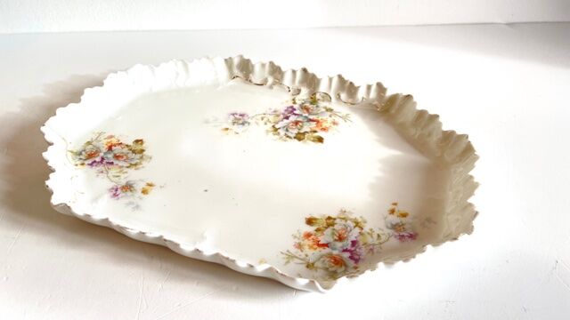 Old tray in floral pattern biscuit
