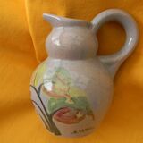 Ceramic pitcher by simone larrieu.