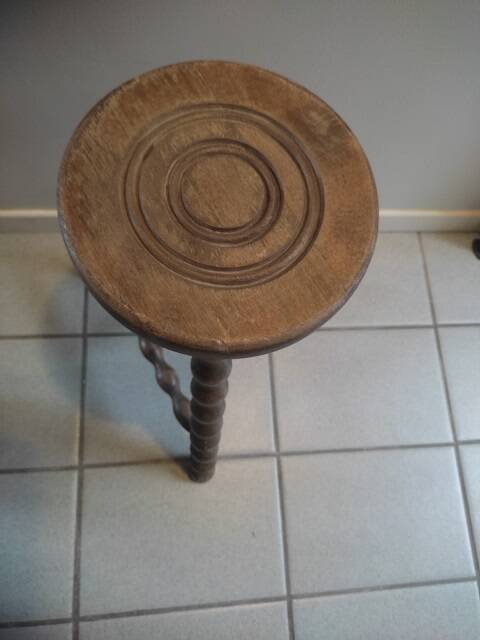 Solid wood stool with patinated varnished tripod legs