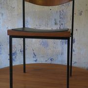 Pair of teak and iron stacking chairs, 1960s