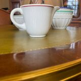 Old porcelain milk jug with barbel decoration