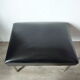 Ottoman foot rest in chrome and black leatherette of the 1950s