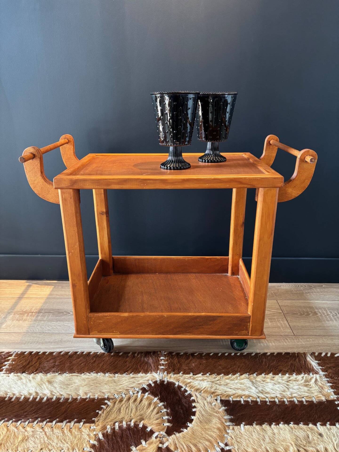 Vintage wooden trolley on wheels
