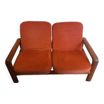 Scandinavian two-seater sofa in teak and red velvet