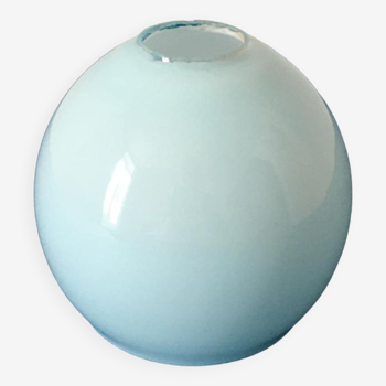 Round glass globe, pale blue on the outside and white on the inside