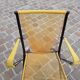 Folding chair in red scoubidou and black metal structure