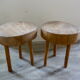 Pair of stools of tripod v with raw wood seat