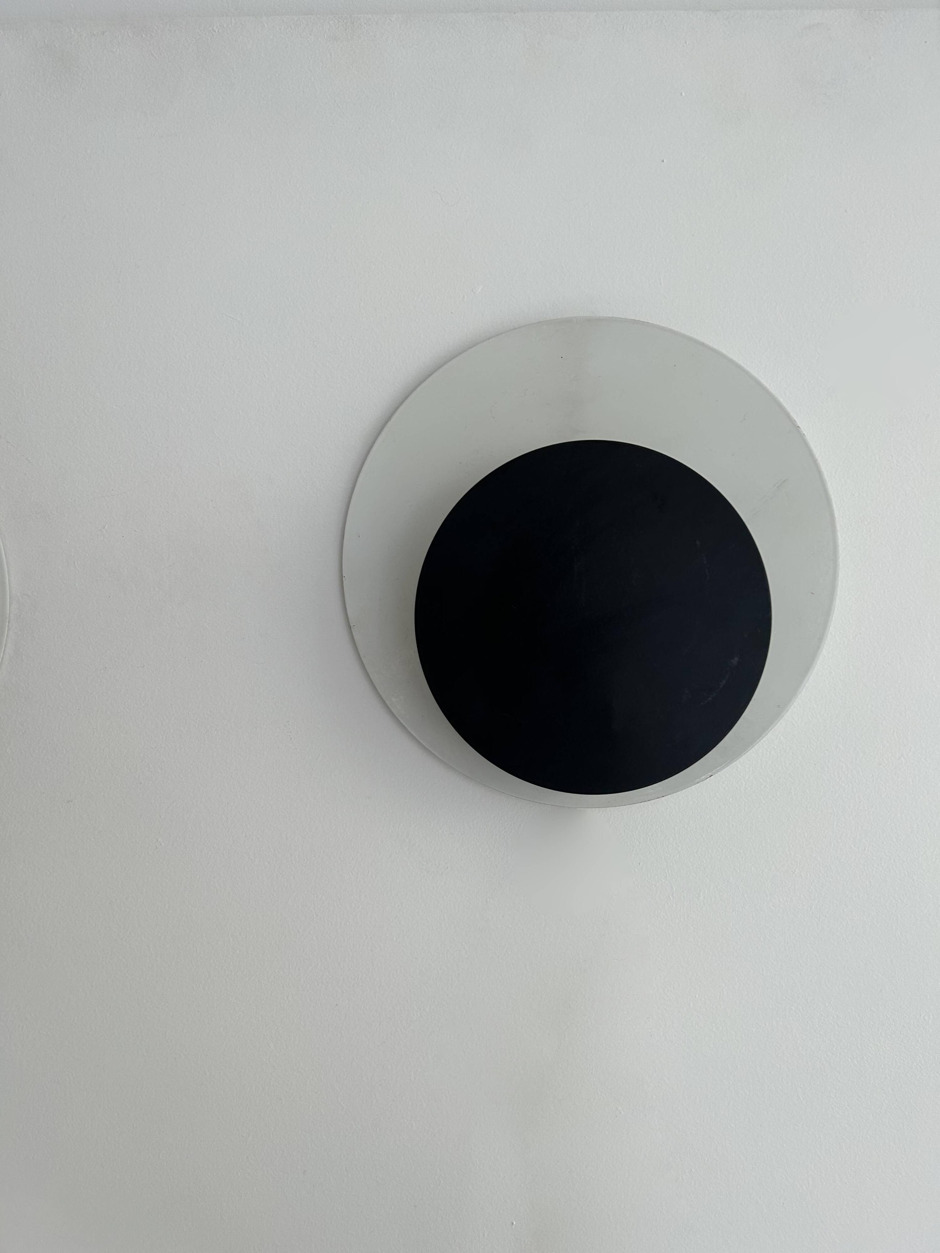 Vintage "Cirkle" wall lamp in black and white lacquered metal, Denmark 1970s