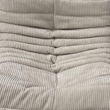 Fauteuil Togo Lounge en velours côtelé beige par Michel Ducaroy pour Ligne Roset.