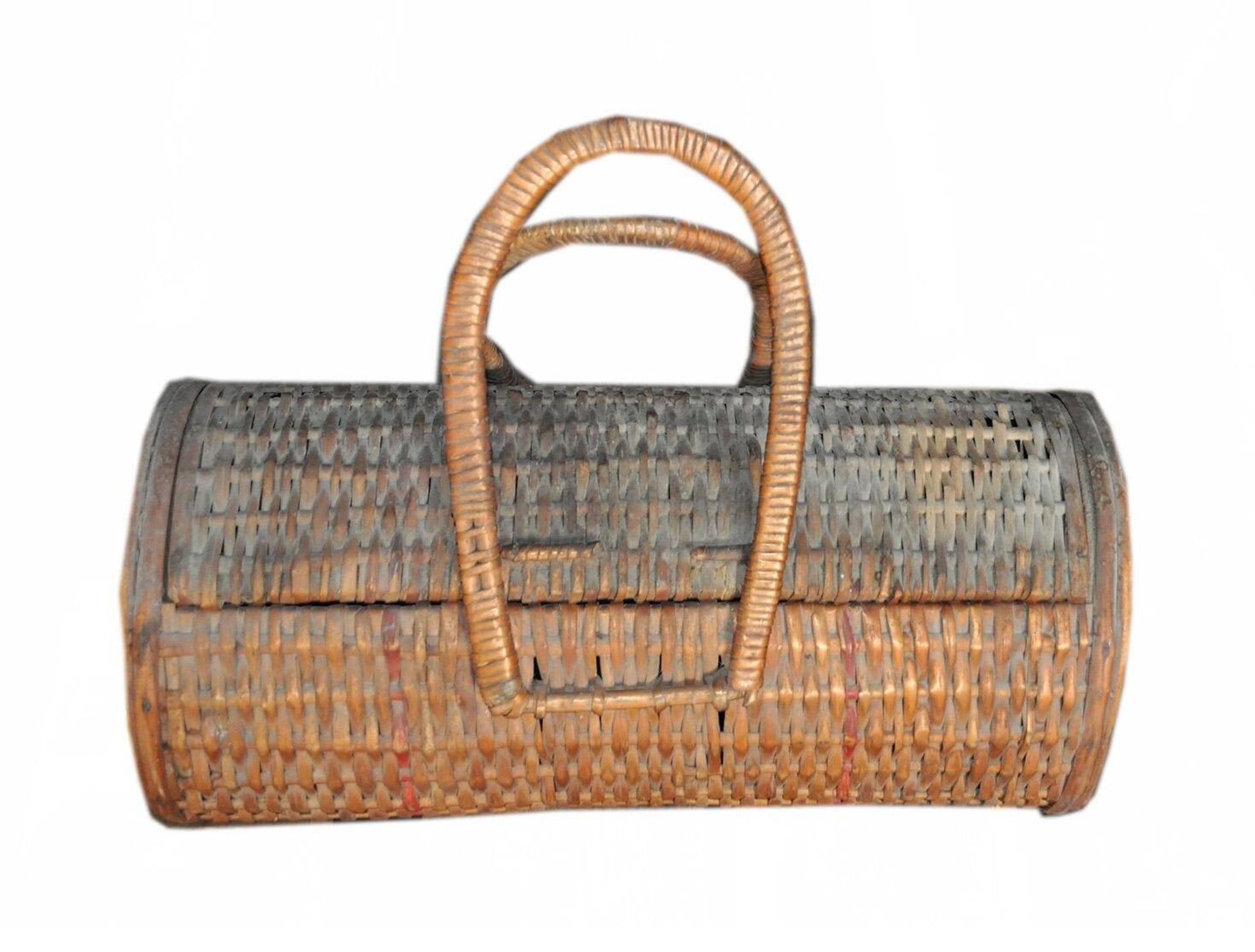 Vintage brown wicker cylindrical basket from the 1940s — long case for a bottle