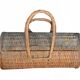 Vintage brown wicker cylindrical basket from the 1940s — long case for a bottle