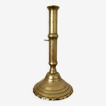Golden brass push candle holder