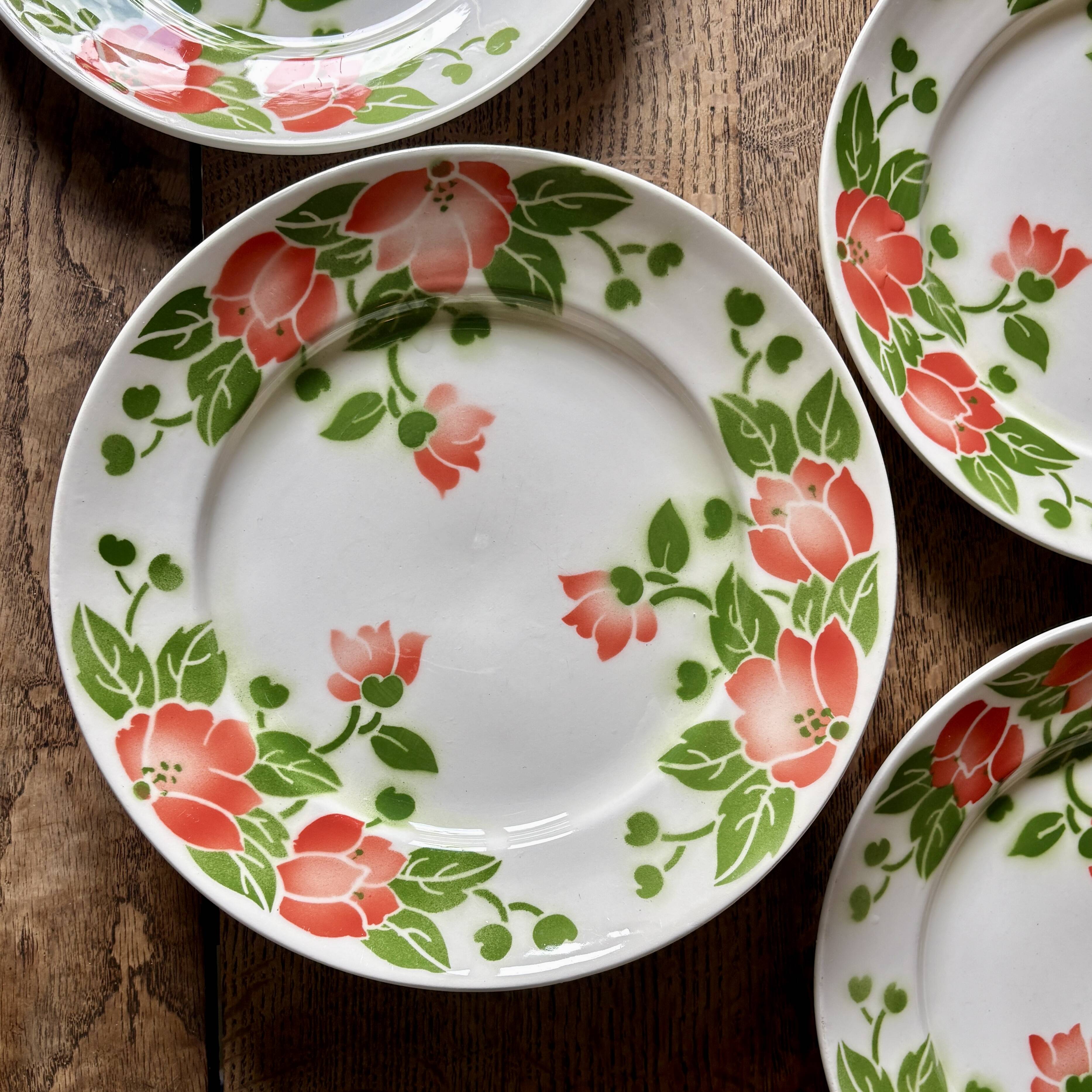 Set of 11 vintage flat plates by Eric de Moulin des Loups.
