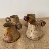 4 pyrite stoneware cups attributed to Jean-Pierre Prudhomme. 1960s.