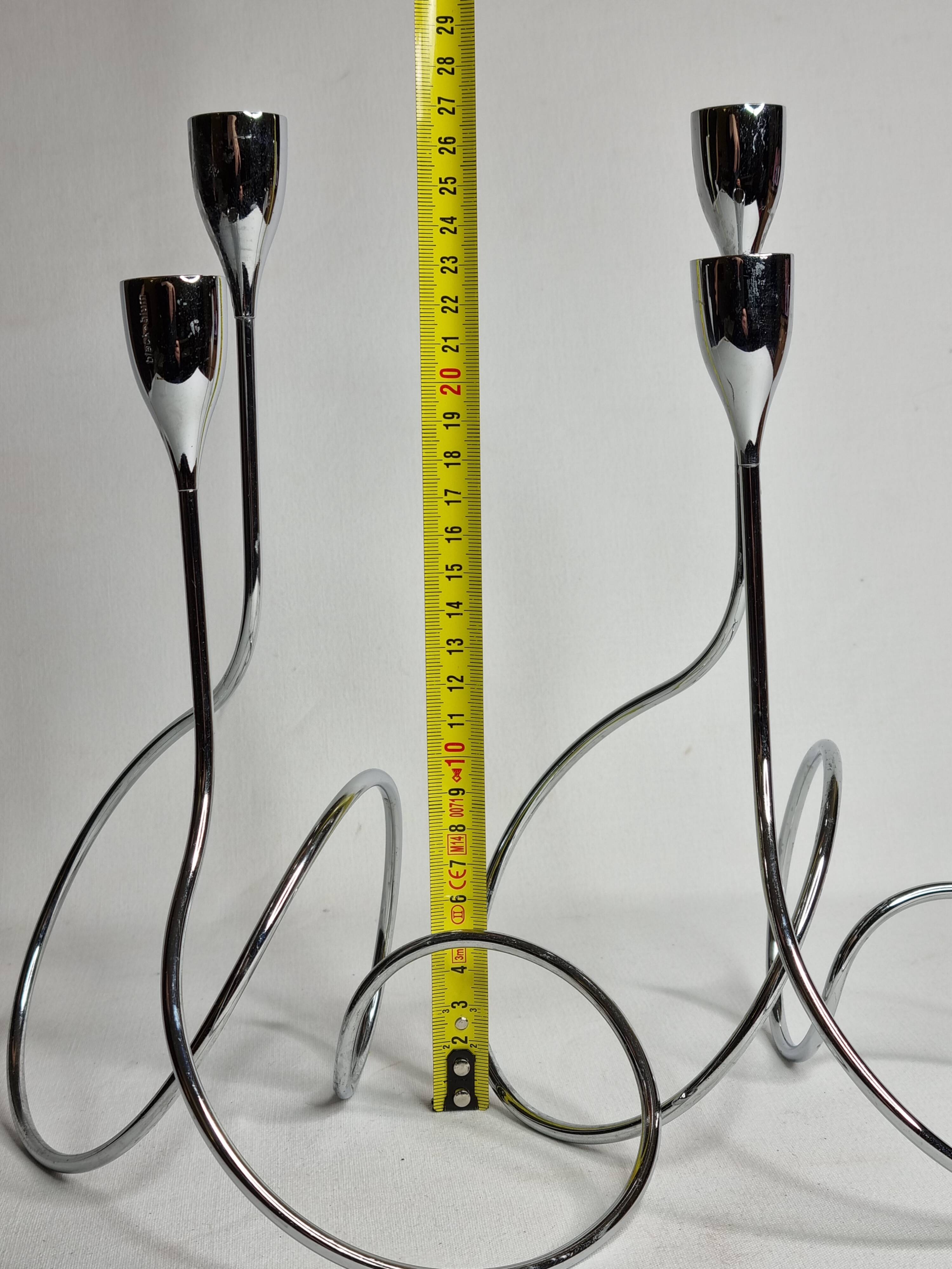 Pair of “Black & Blum” designer candlesticks in chrome-plated metal, 27 cm