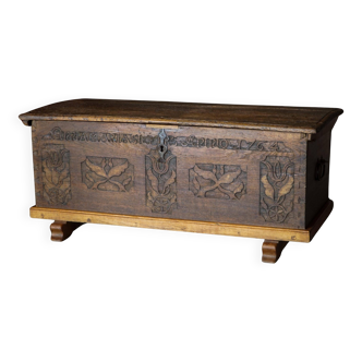 18th-century Scandinavian popular art oak chest with carved panels, dated 1764.