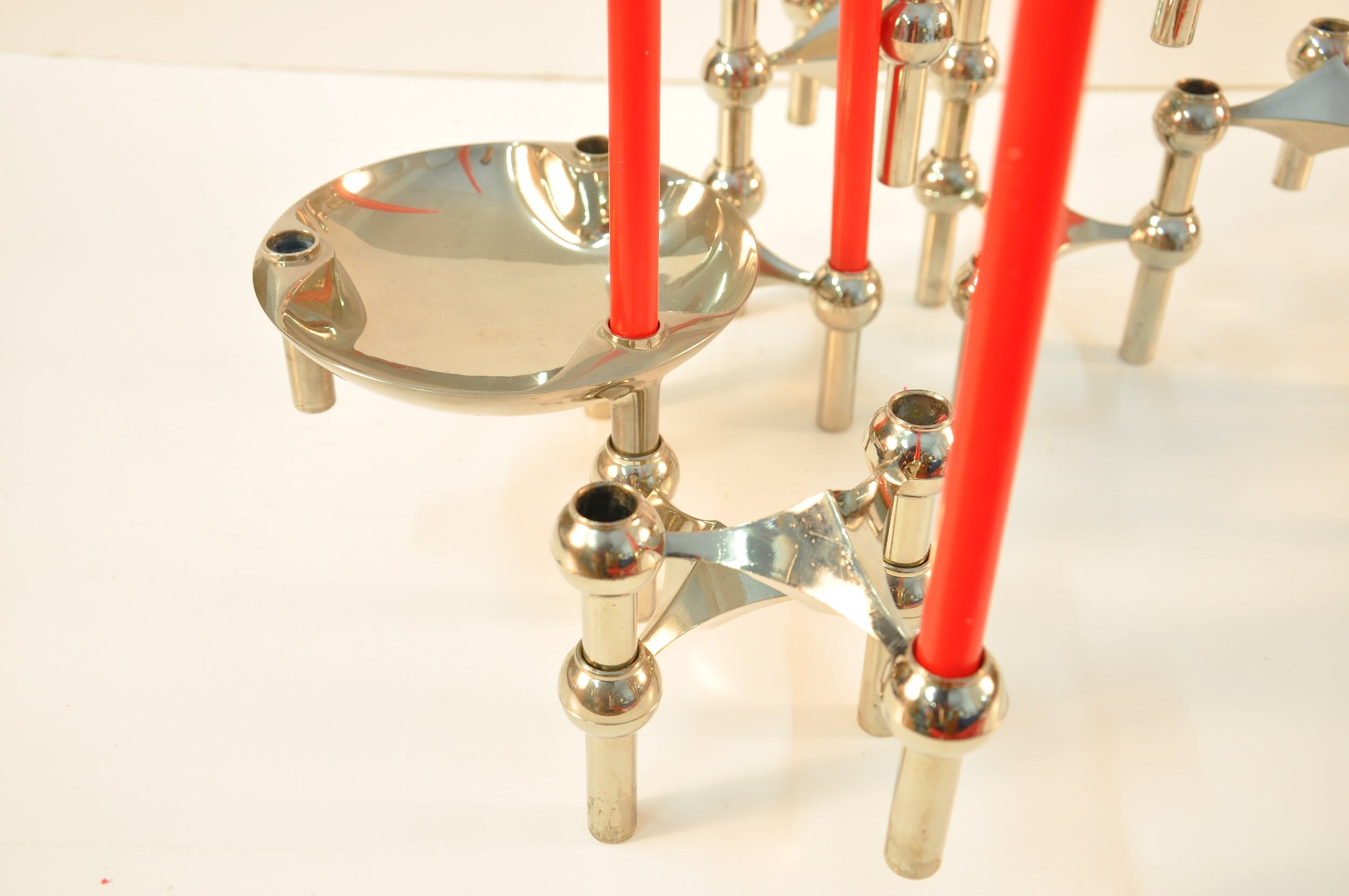 9 candlesticks and a Nagel Cup