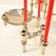 9 candlesticks and a Nagel Cup