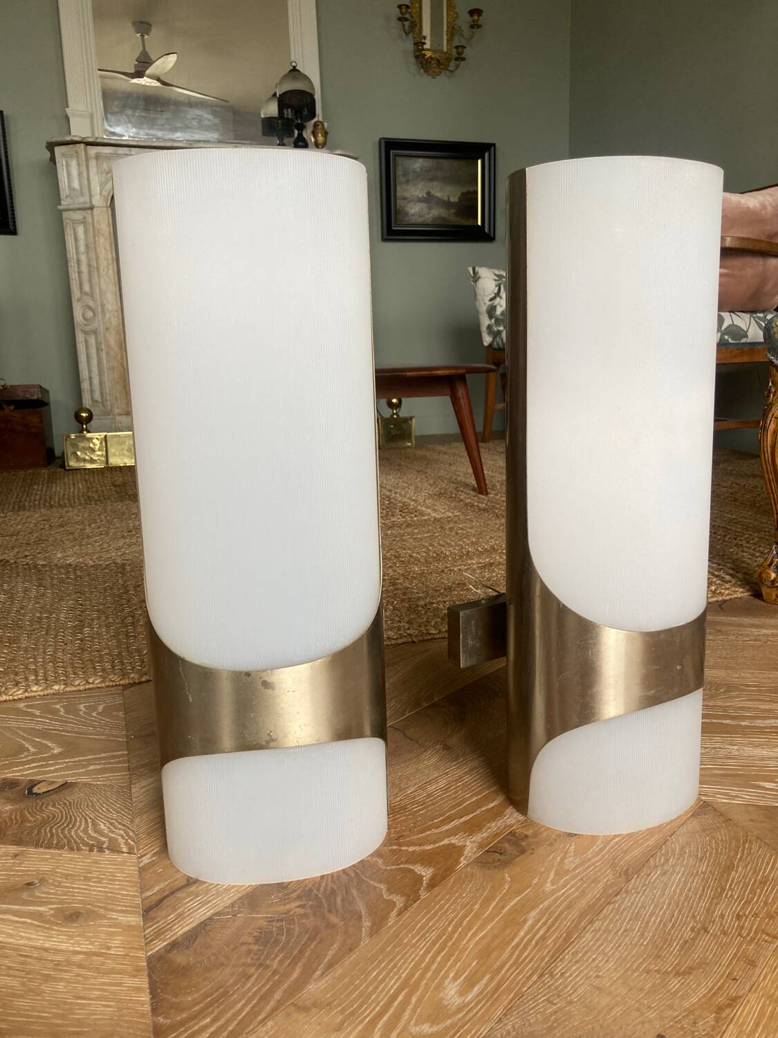 Brushed metal and ribbed opal plastic wall lights