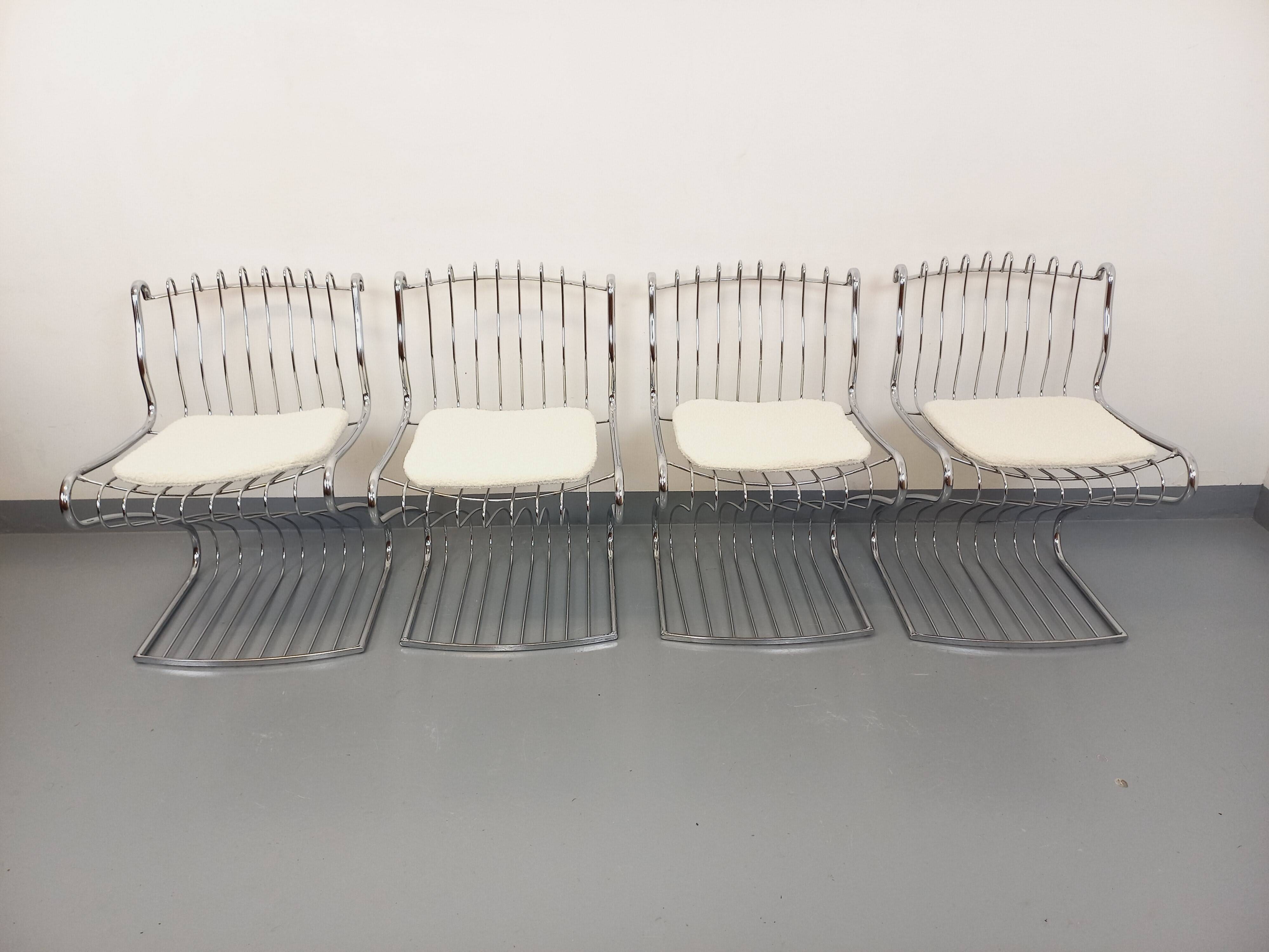 Set of 4 vintage Italian chairs by Gastone Rinaldi in chrome metal.
