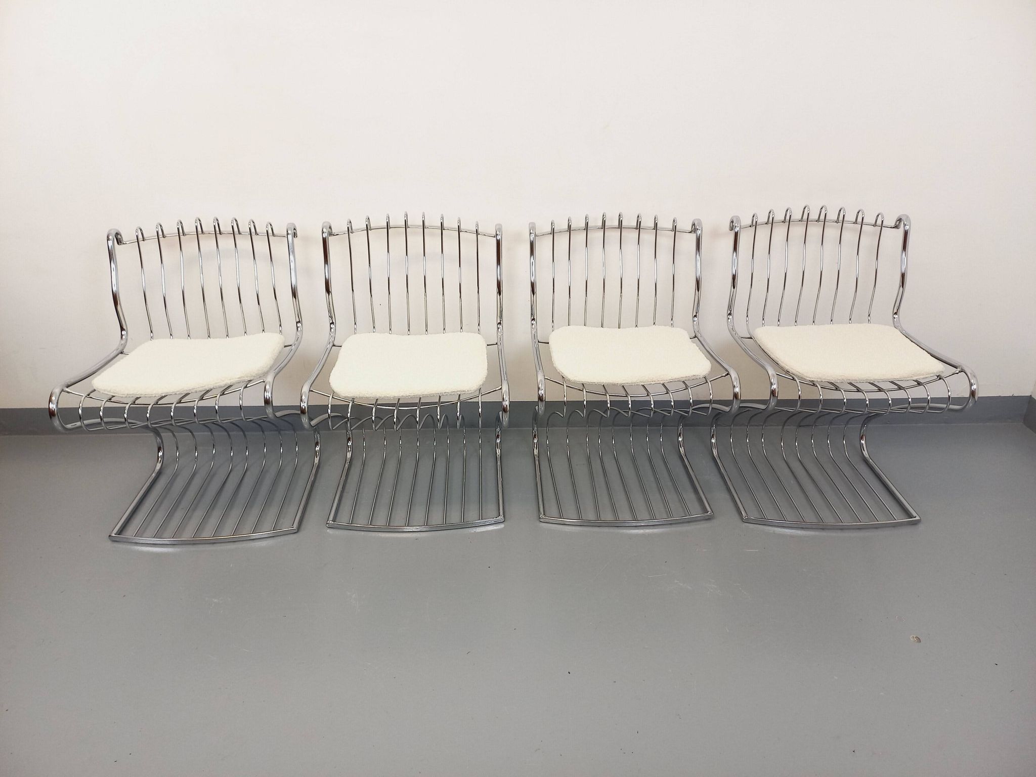Set of 4 vintage Italian chairs by Gastone Rinaldi in chrome metal.
