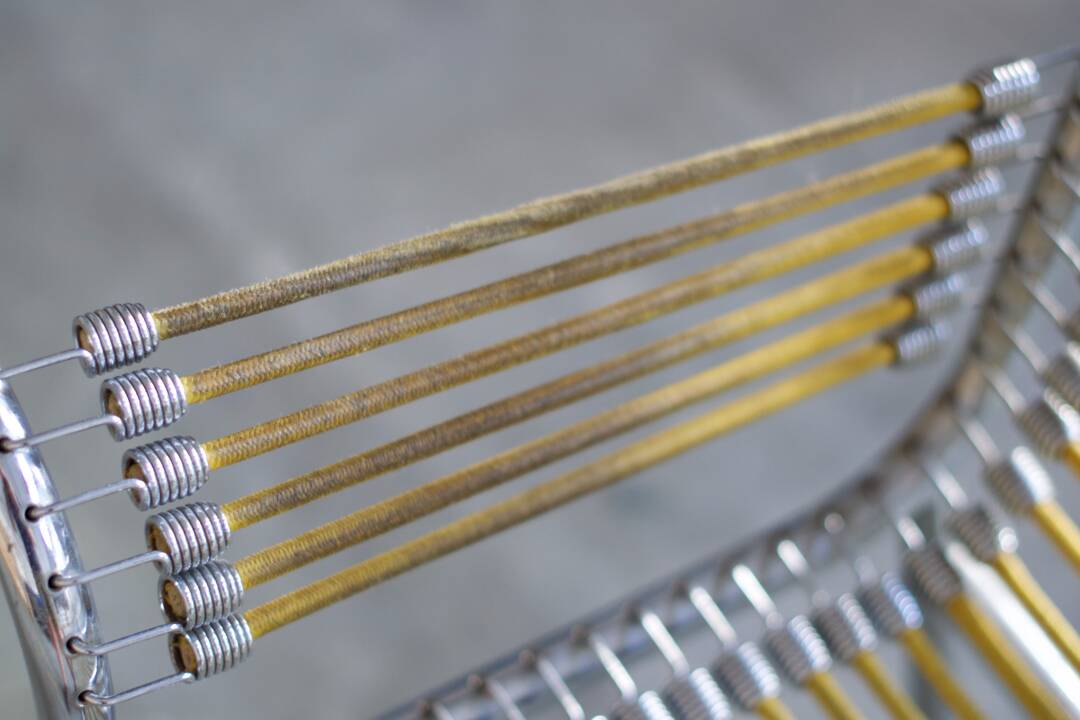 Two Rene Herbst Infabrica style Bungee armchairs