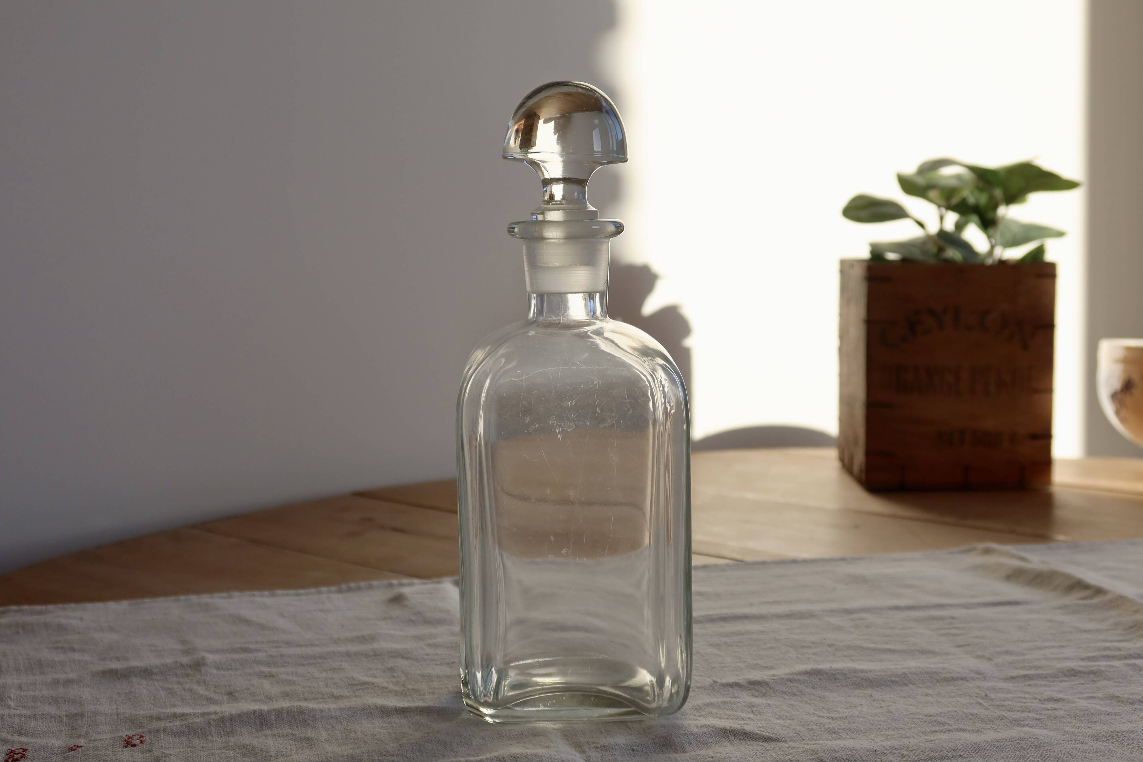 Antique glass carafe with stopper