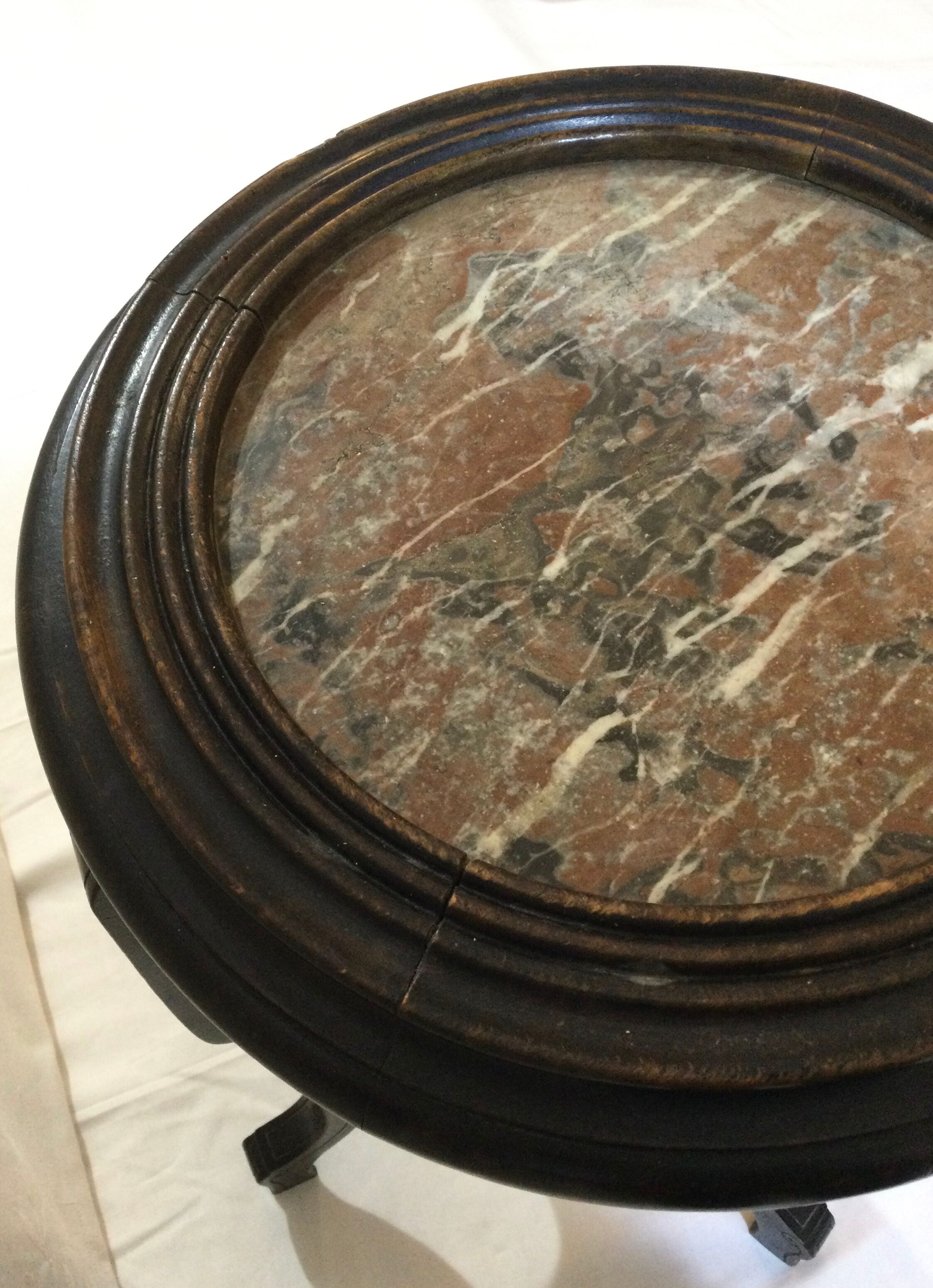 Blackened wooden and marble harness