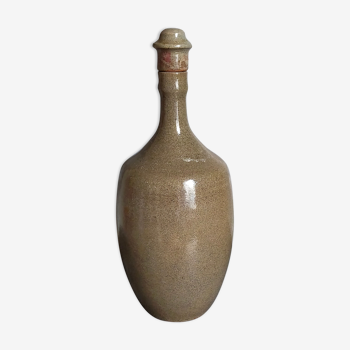 Vintage glazed stoneware potter's liquor bottle