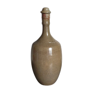 Vintage glazed stoneware potter's liquor bottle
