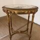 Wooden and marble pedestal table