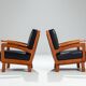 Pair of Belgian lounge chairs in solid oak with leather cushions