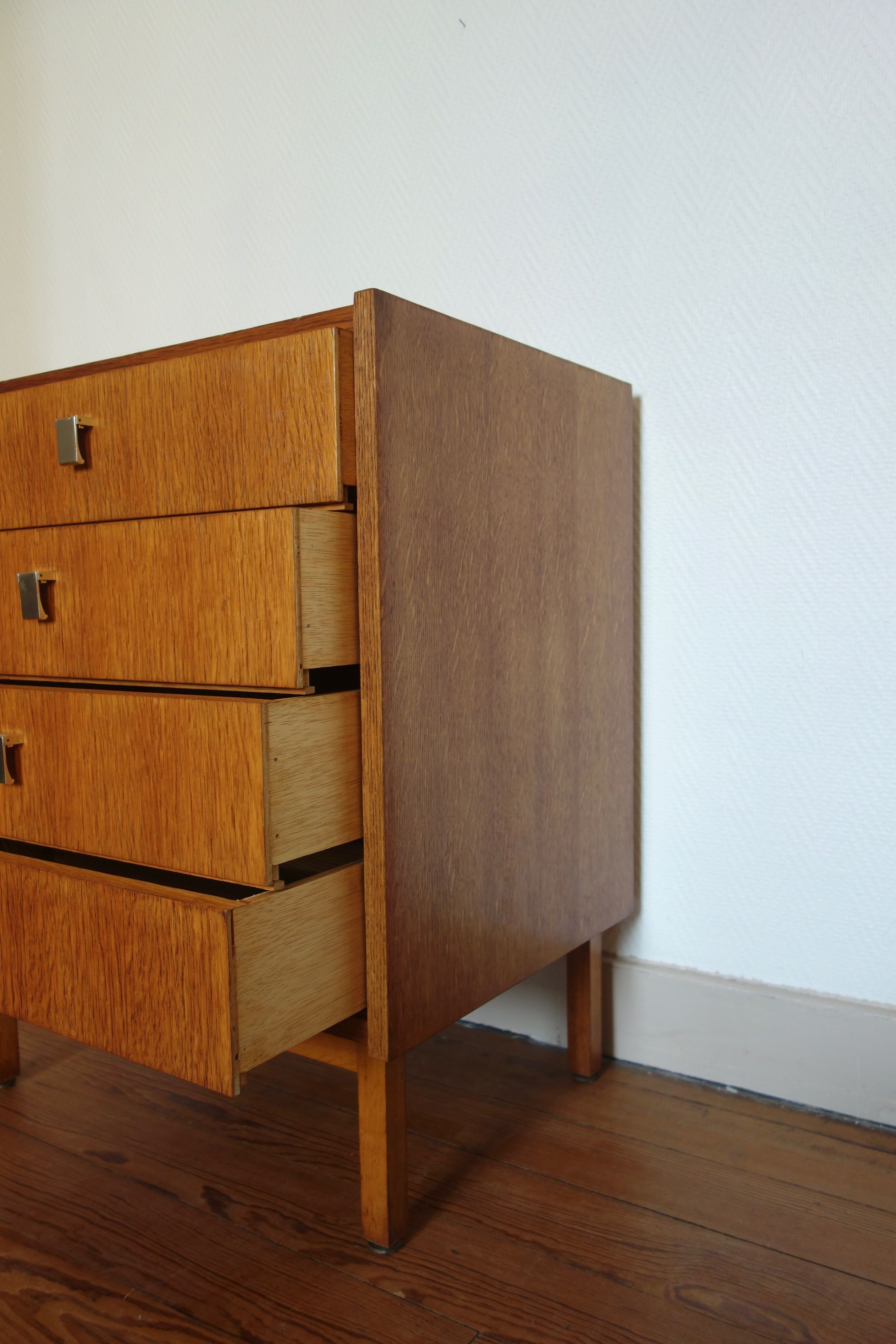 The 1950s oak chest of drawers