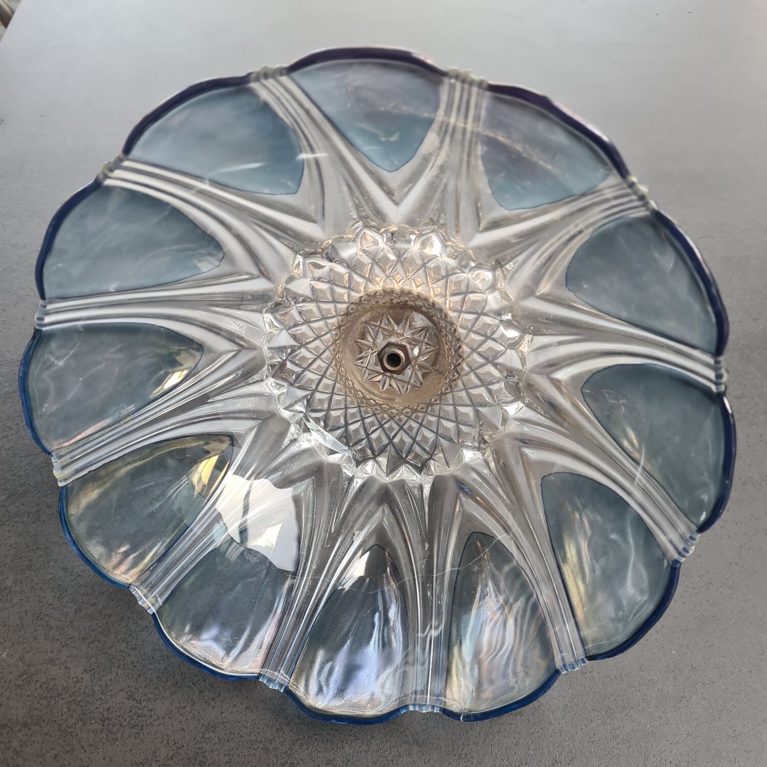 Glass lampshade with brass angel