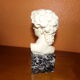 Ancient subject bust on marble base