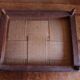 Small antique wooden and fabric footrest.